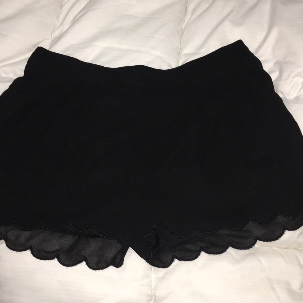 Black scallop shorts